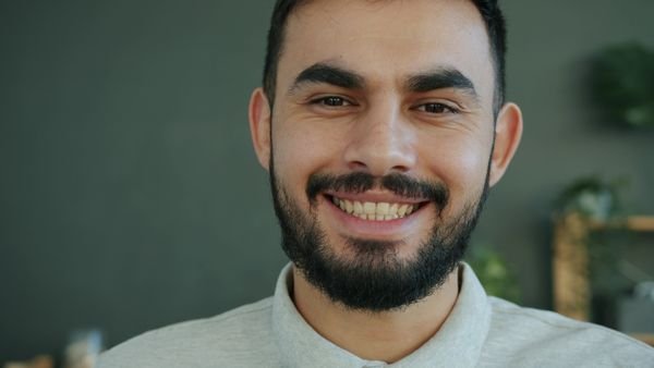 Portrait of a smiling man in his forties.